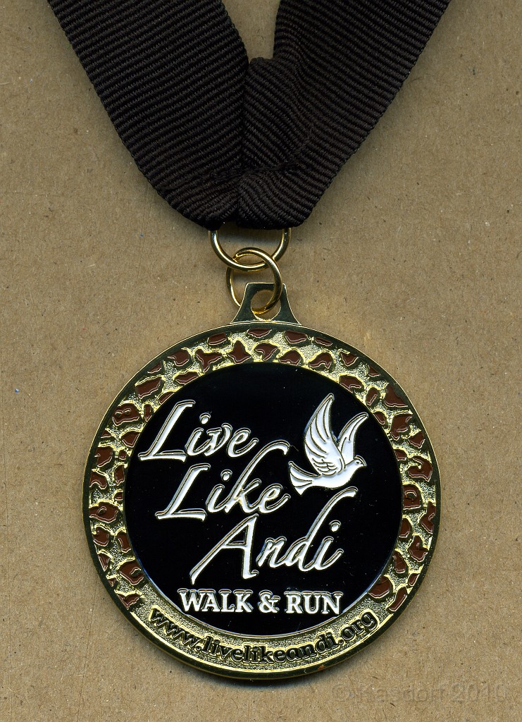 Live Like Andi 2010 177.jpg - A fairly nice medal. Not outstanding, but for the price of the race it is nice.